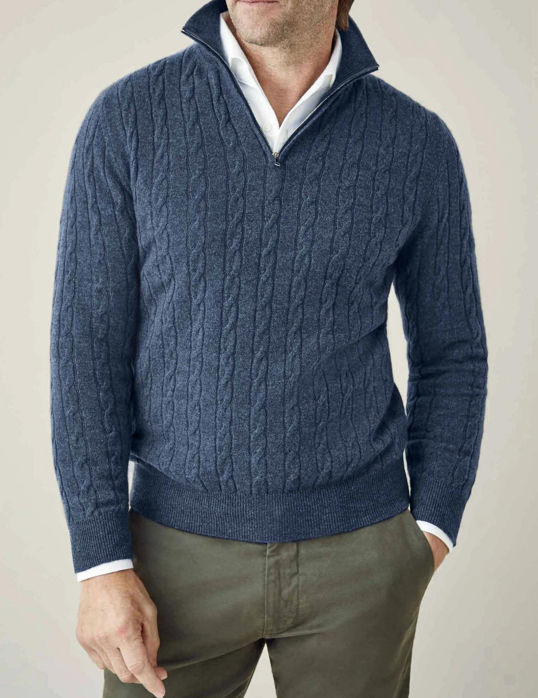 Men's cable knit quarter-zip sweater in a timeless style, perfect for fall and winter layering.