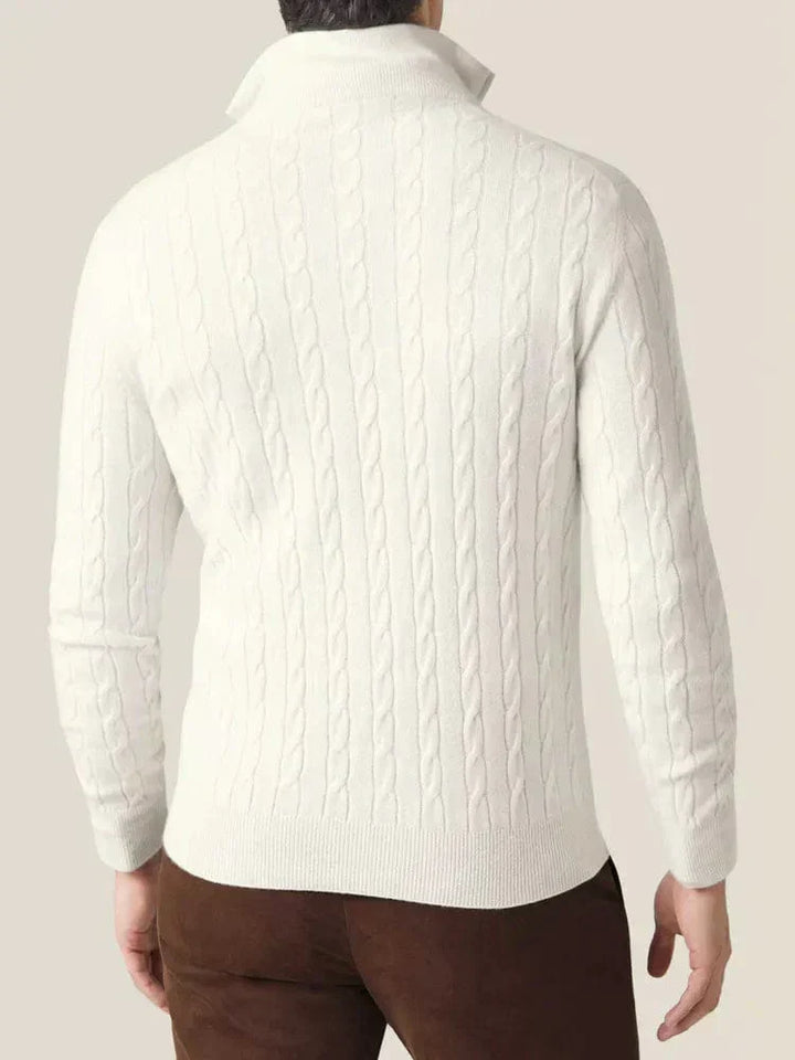 Versatile men's cable knit quarter-zip sweater, great for smart casual or relaxed winter outfits.