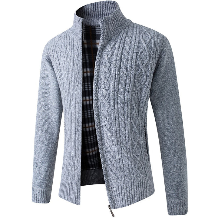 Men's cable knit zipped cardigan, warm and stylish layer for winter fashion. High-quality outerwear.