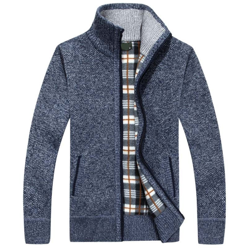 Stylish men's zipped cable knit cardigan in navy blue, versatile for layering and cool weather.