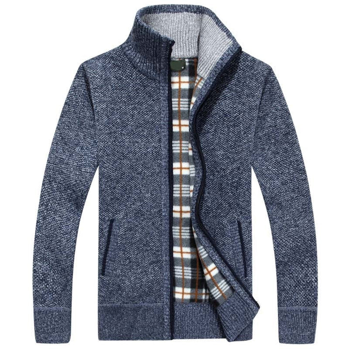 Stylish men's zipped cable knit cardigan in navy blue, versatile for layering and cool weather.