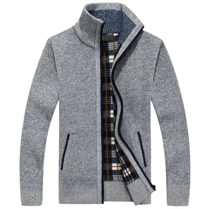Warm men's cable knit sweater with a full zipper, perfect for cozy winter fashion and outdoor activities.