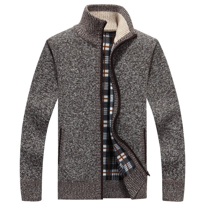 Man wearing a comfortable brown zipped cable knit cardigan, a modern and stylish men's fashion piece.