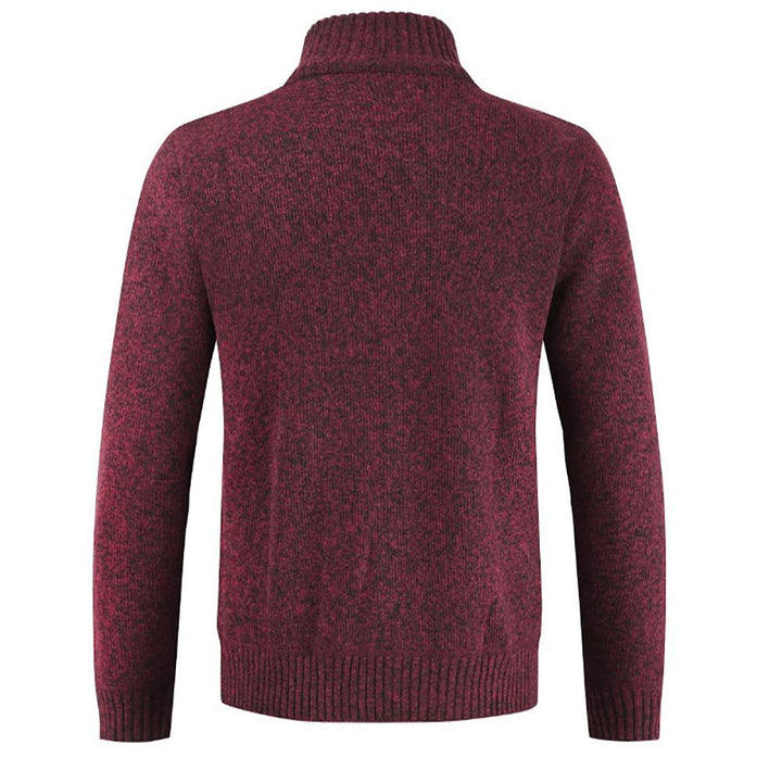 Light colored men's zipped cable knit cardigan, a versatile and soft sweater for casual and smart-casual looks.