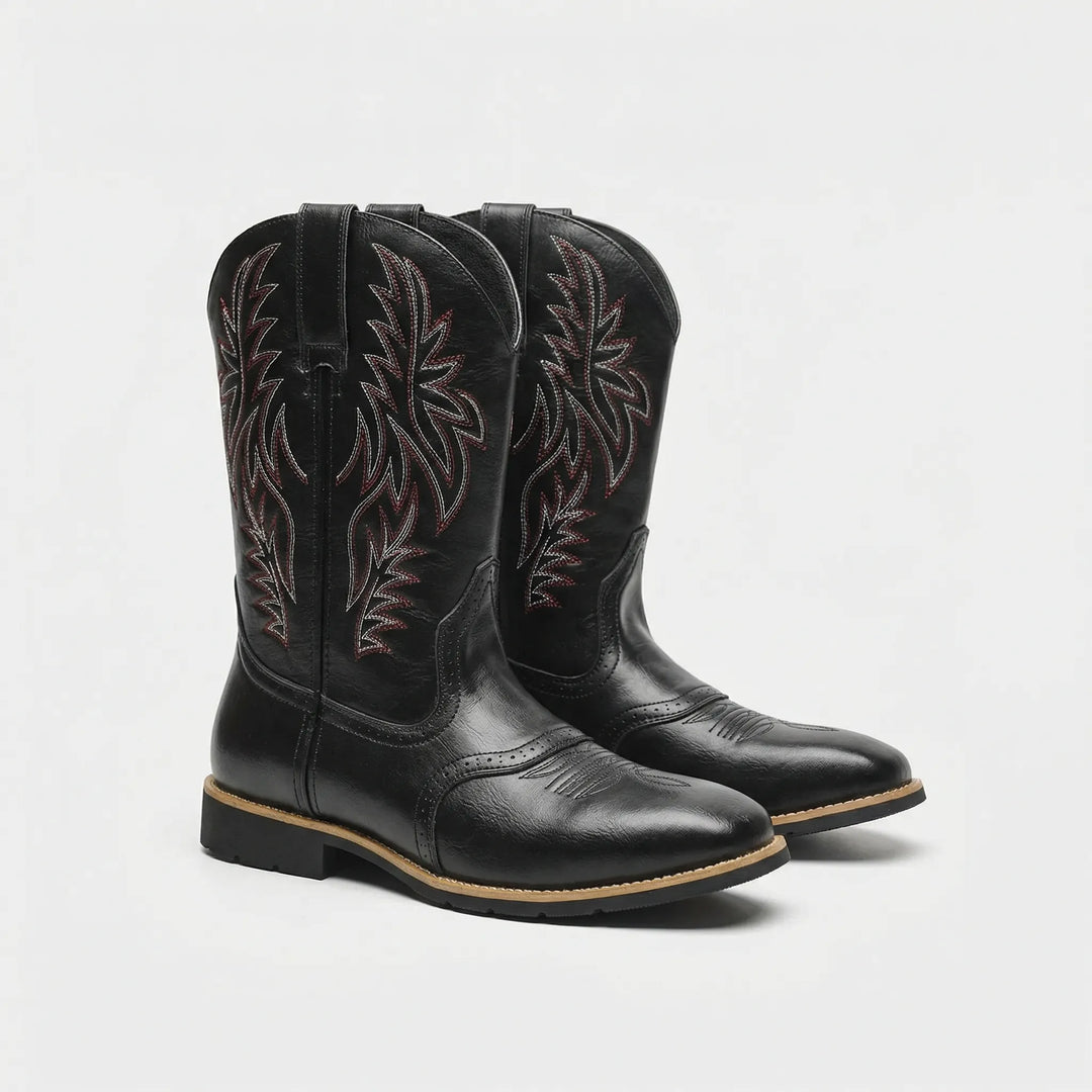 Slip-on men's calf-length cowboy boots featuring intricate Western embroidery and a sturdy block heel.