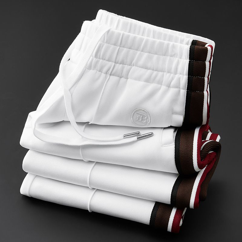 Sporty men's Callahan spliced casual pants, elastic waist for flexible, no-iron everyday style.