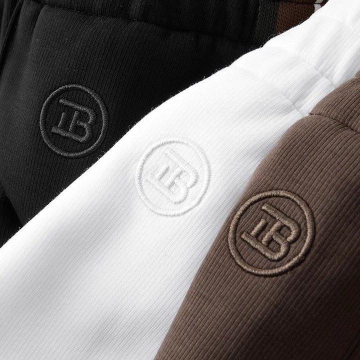 Stylish men's Callahan pants with elastic waist & spliced detail; ideal for versatile casual outfits.
