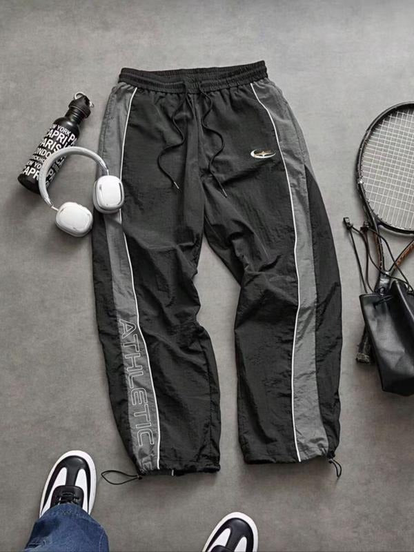 Men's Calvera sportswear track pants. Versatile athletic joggers for training, gym, & comfort.