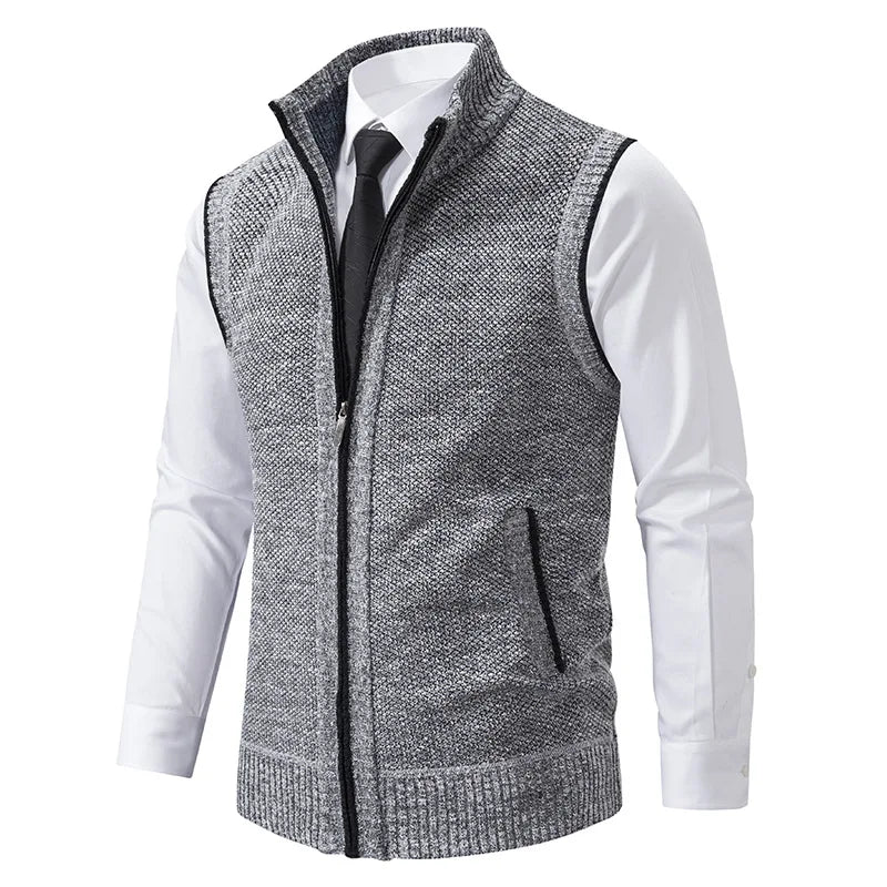 Modern men's full-zip knit vest, turtleneck style for smart casual autumn and winter layering.