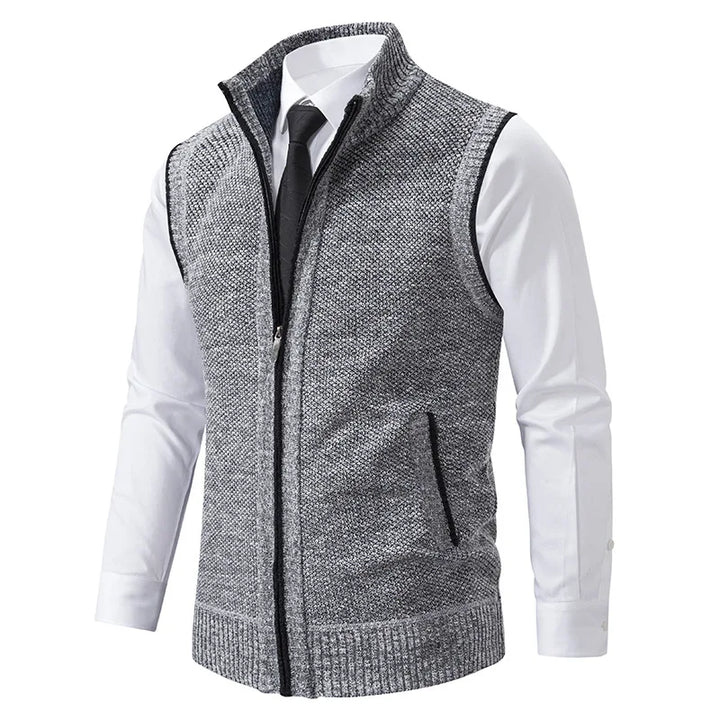 Modern men's full-zip knit vest, turtleneck style for smart casual autumn and winter layering.