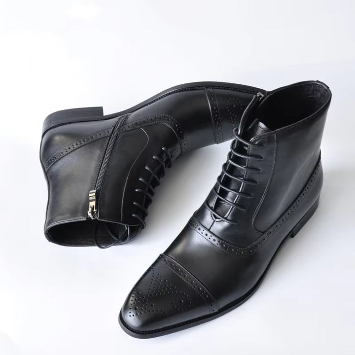 Formal men's dress boots with brogue perforations, cap-toe & side zipper. Perfect business footwear.