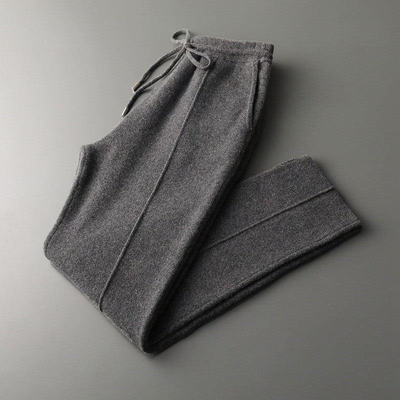 Men's relaxed fit cashmere blend lounge trousers with adjustable drawstring waist for comfort.