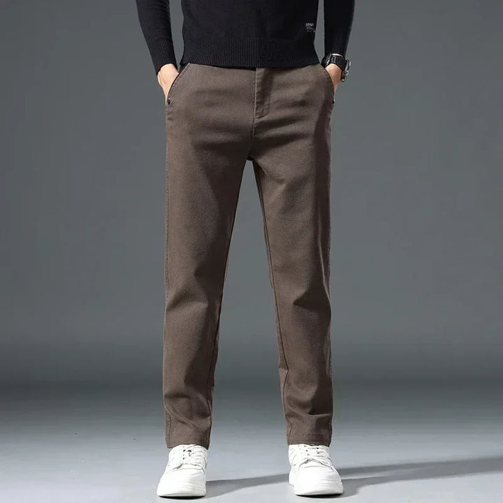 Stylish men's casual pants with elastic waist, wrinkle-resistant, modern for work or everyday.