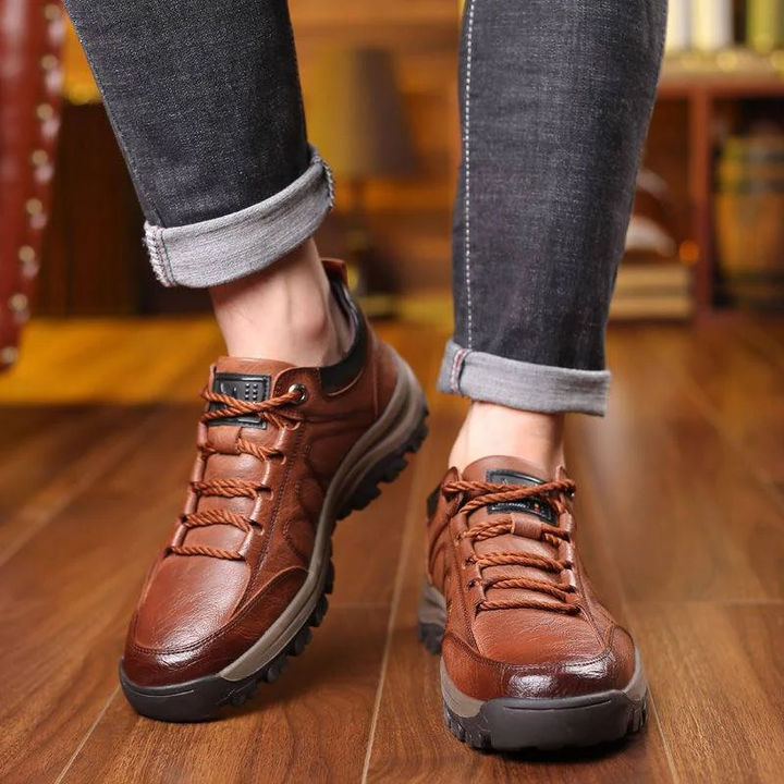 Close-up of the quality hand-stitching on men's casual comfort shoes with arch support.