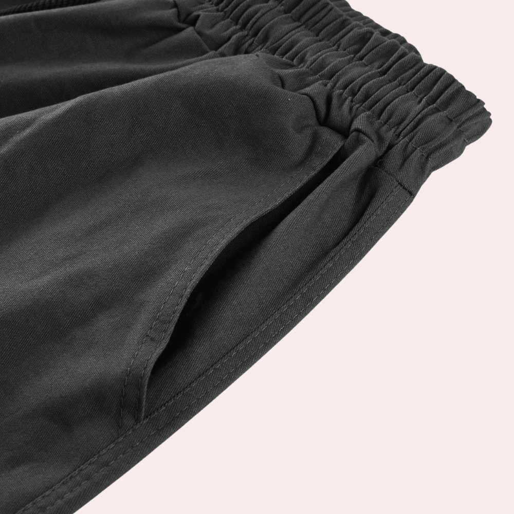 Relaxed fit men's cargo trousers, offering both comfort and functional pockets.