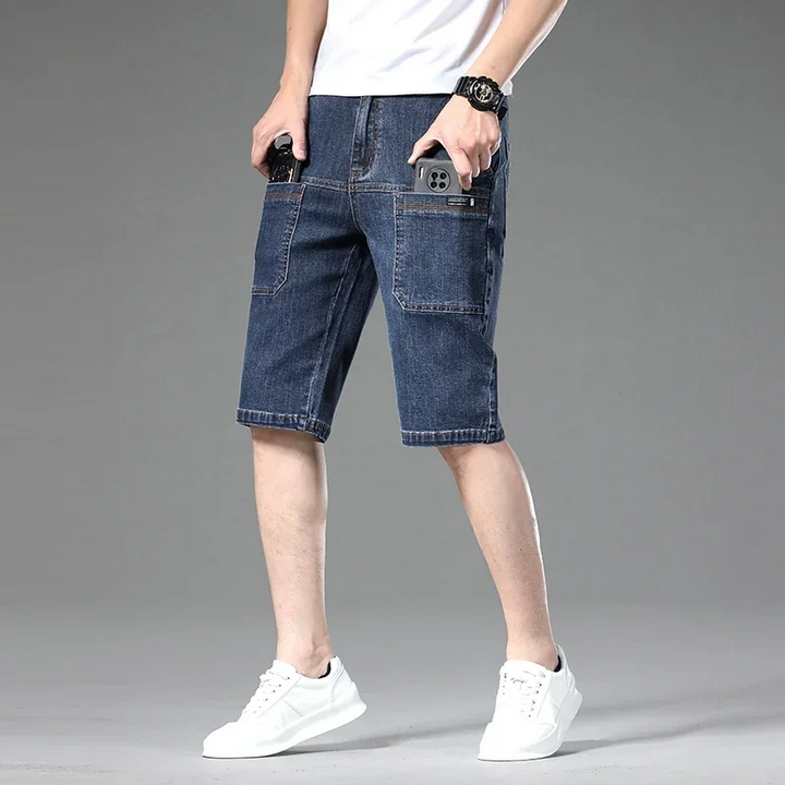 Men's multi-pocket cargo utility shorts. Relaxed fit for comfortable everyday summer adventures.