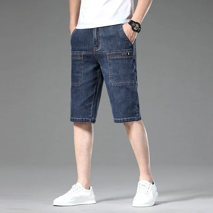 Versatile men's utility shorts with multiple pockets, relaxed fit style for comfortable casual outfits.