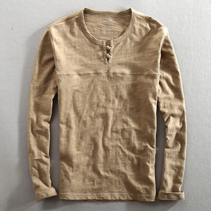 Men's casual khaki long-sleeve henley shirt. Comfortable everyday top with button-up style.