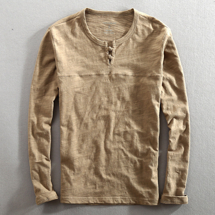 Men's casual khaki long-sleeve henley shirt. Comfortable everyday top with button-up style.