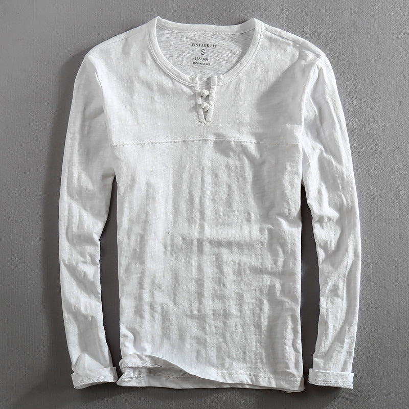 Comfortable men's white long-sleeve henley. Soft everyday top for casual style and versatility.