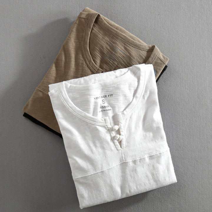 Men's long-sleeve button-up henley shirt. Casual and comfortable top in multiple colors for daily style.