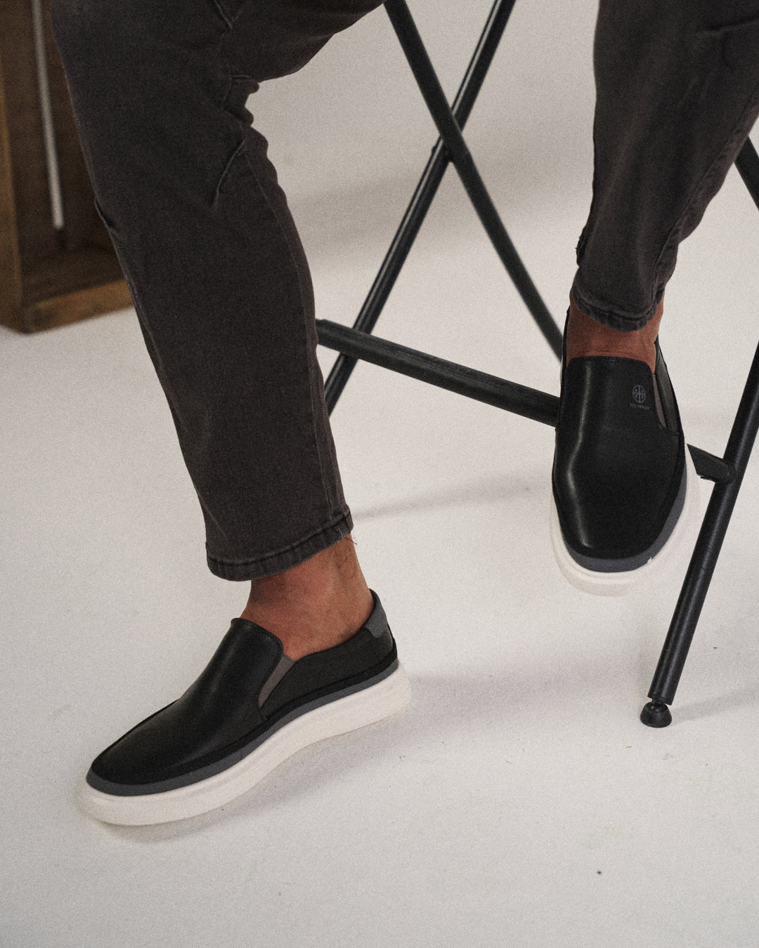 Premium brown leather men's slip-on shoes, offering comfort and durability.