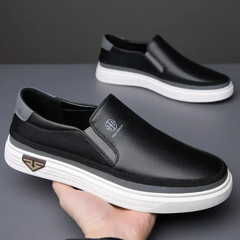 Classic men's casual leather slip-on loafers, offering comfortable everyday footwear.