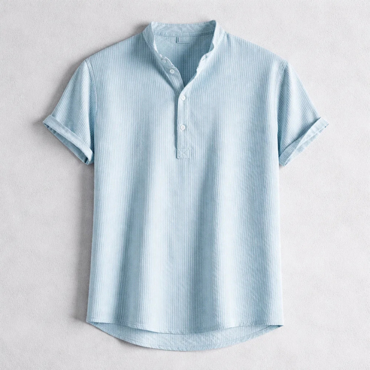 Man wearing a versatile long sleeve Henley shirt, demonstrating its casual comfort & modern men's fashion style.