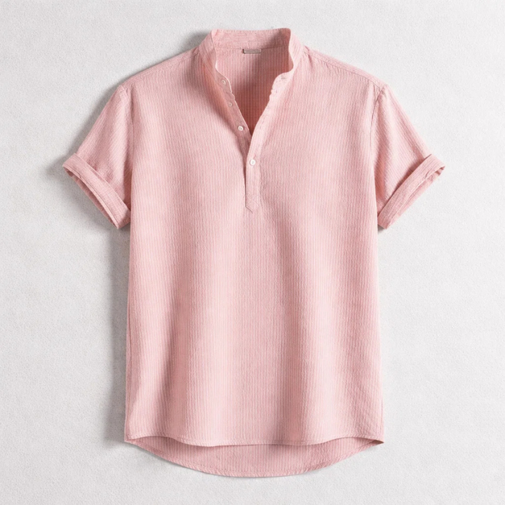 Detail shot of a men's Henley shirt collar and cuffs, emphasizing its tailored style and quality for men's fashion.