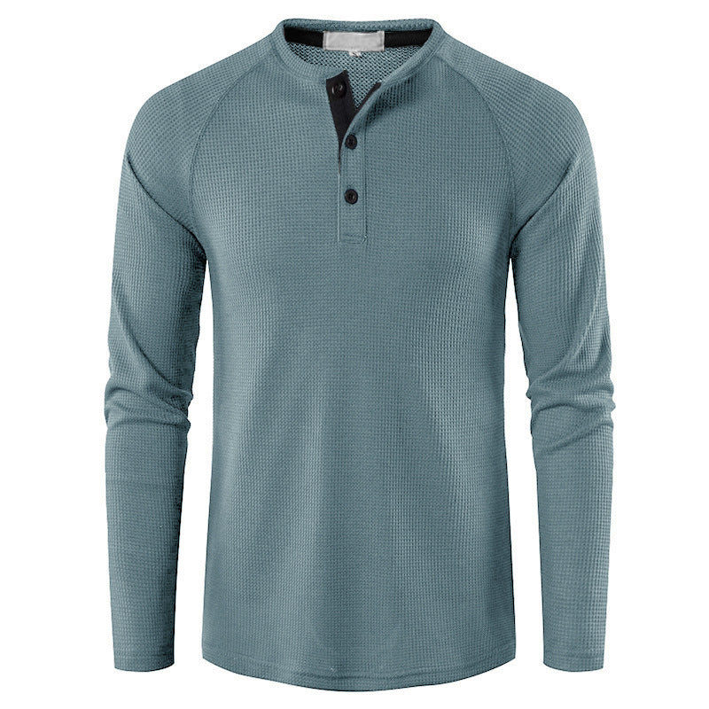 Relaxed fit men's long sleeve henley shirt for comfortable, stylish casual wear. Essential everyday fashion.