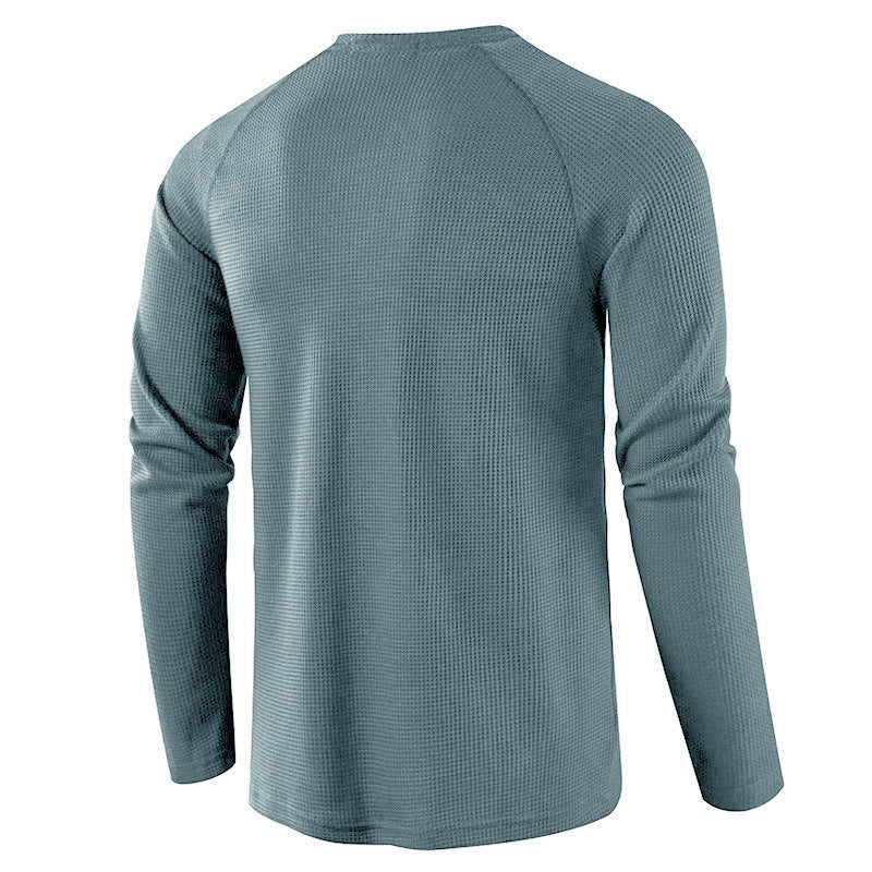 Minimalist men's long sleeve henley shirt, a comfortable and stylish choice for versatile casual wear.