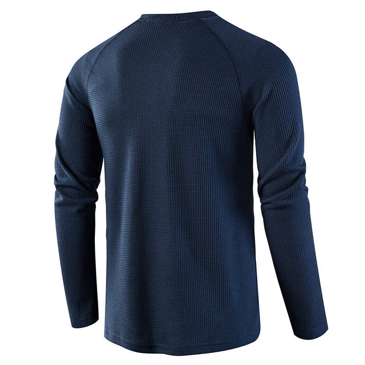 Men's casual henley shirt featuring a button placket, long sleeves, and comfortable fit for daily wear.