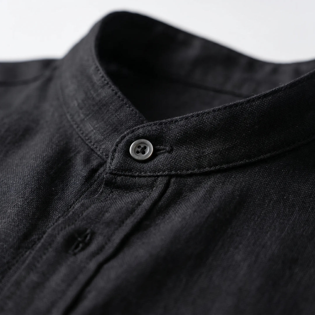 Lightweight men's summer shirt with a mandarin collar, offering comfort & style for warm weather outfits.