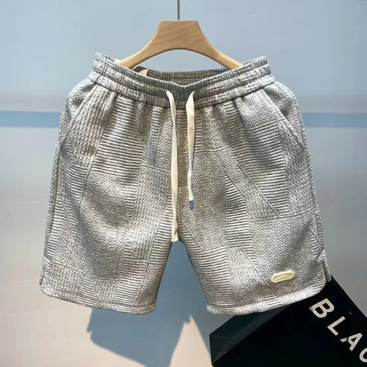 Henry men's sportswear shorts, designed for summer comfort with breathable material and practical pockets
