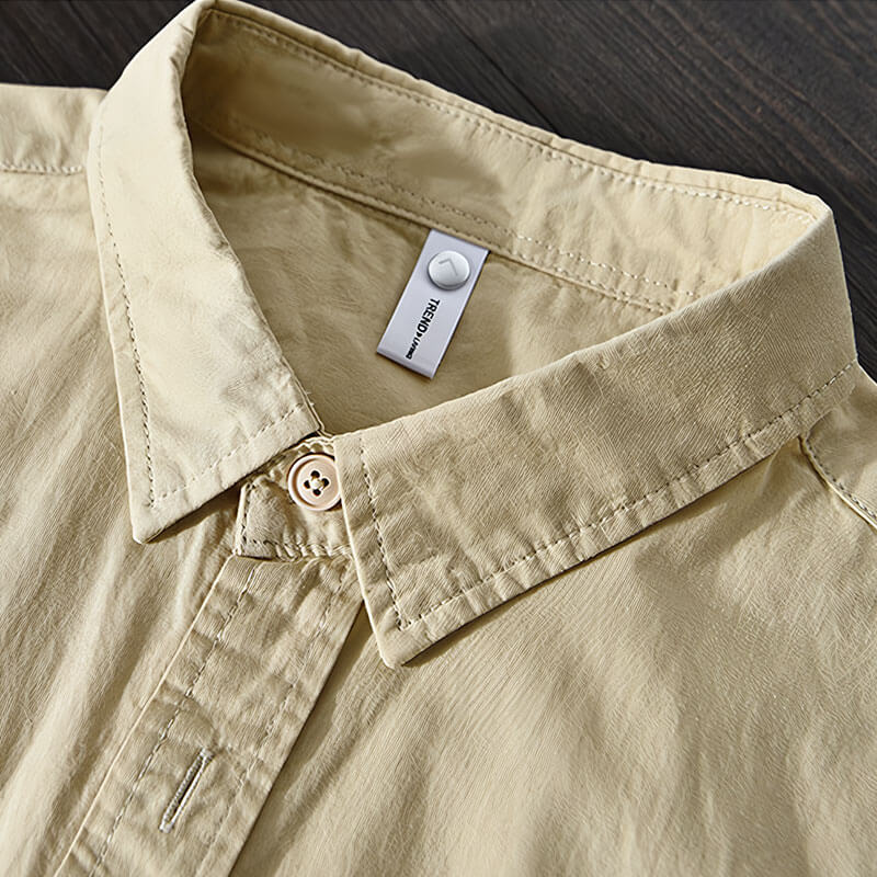 Comfortable men's relaxed fit button-up shirt, long sleeve, perfect casual wear for spring & summer days.