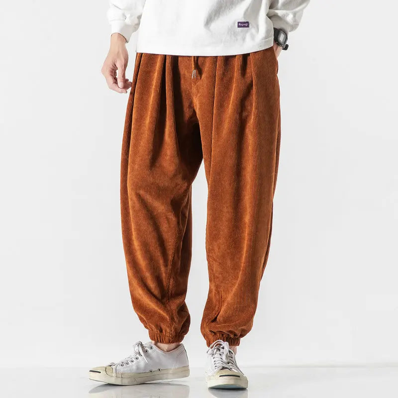 Men's casual relaxed fit corduroy pants with comfortable drawstring waist, perfect for everyday style.