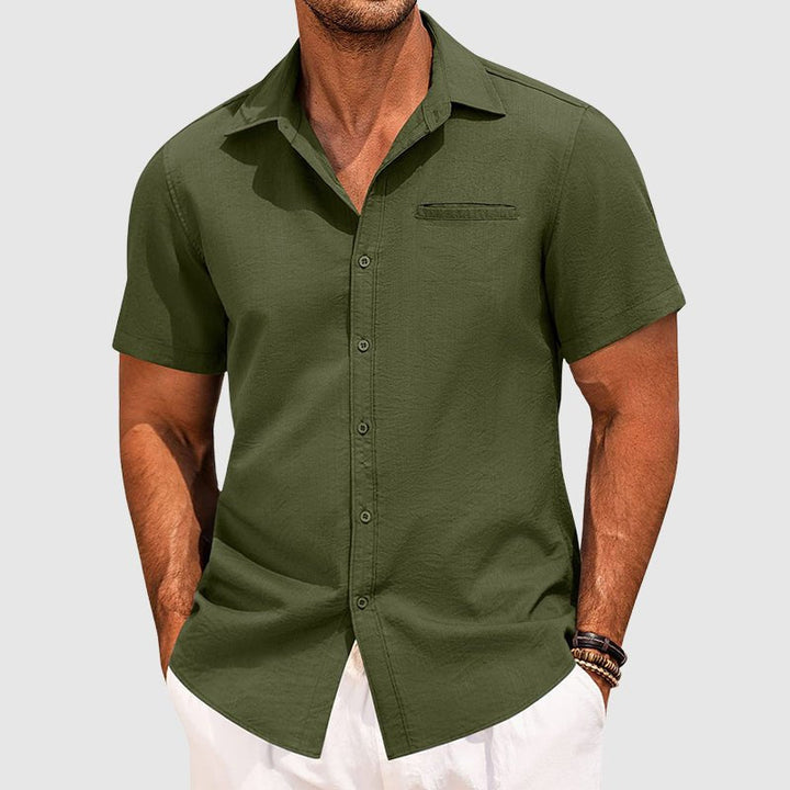 Men's casual short sleeve button-down summer shirt with a chest pocket. Modern and versatile for warm weather.