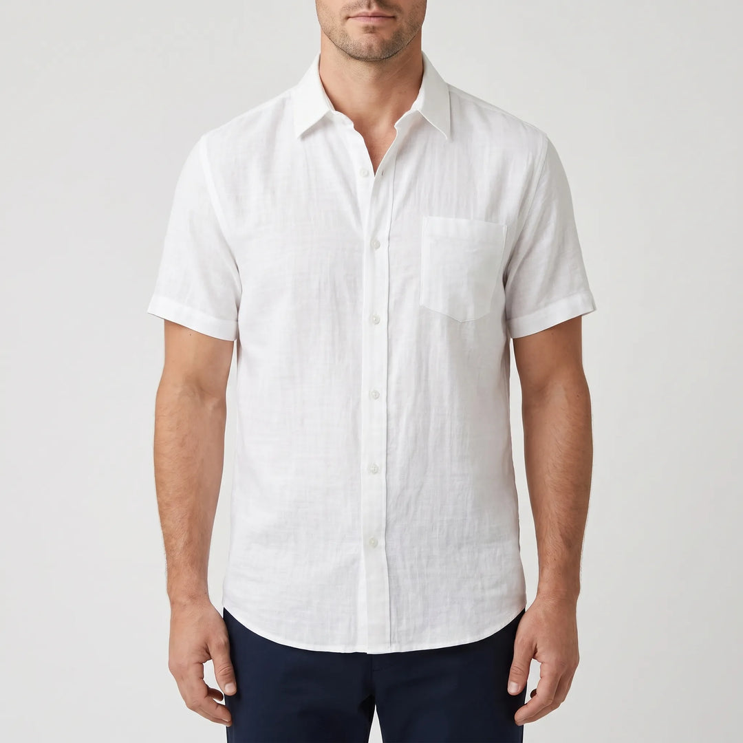Stylish men's solid color short-sleeve summer shirt. Casual button-down, ideal for warm days & fashion.