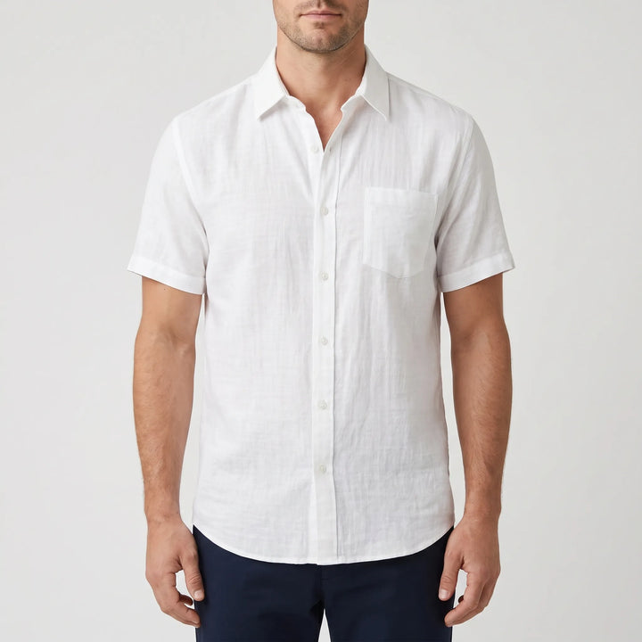 Stylish men's solid color short-sleeve summer shirt. Casual button-down, ideal for warm days & fashion.