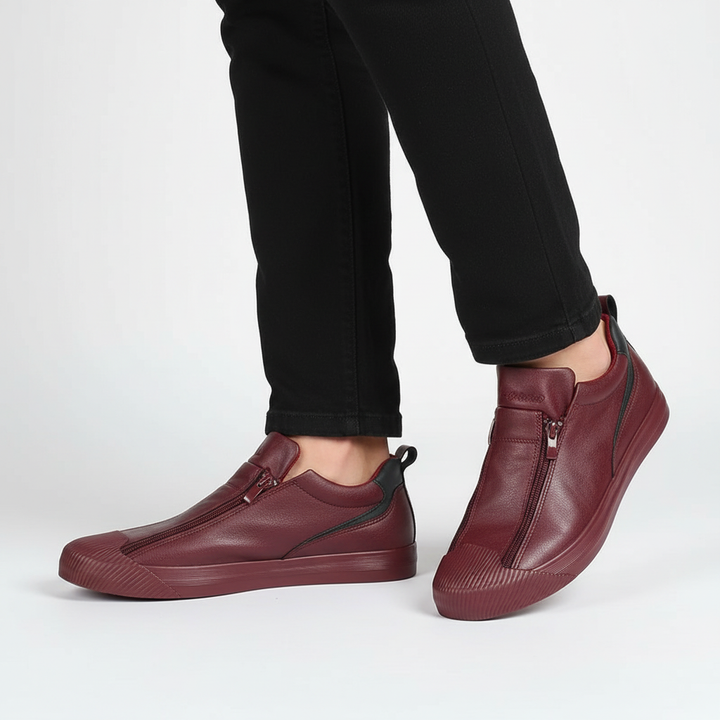 Top-down view of black Russell men's slip-on loafers, highlighting zipper and cushioned footbed