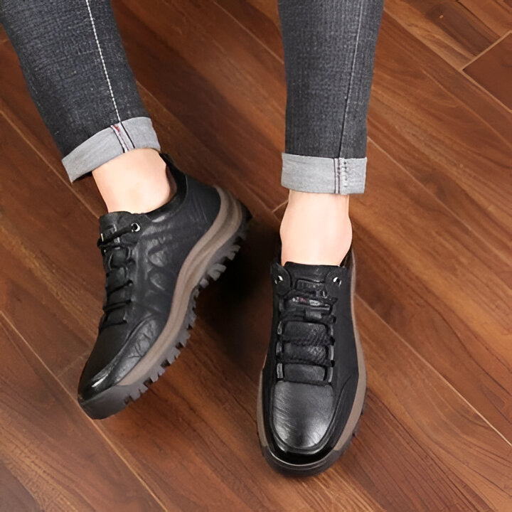 Hand-stitched men's casual slip-on shoes for daily wear. Comfortable with arch support and non-slip sole.