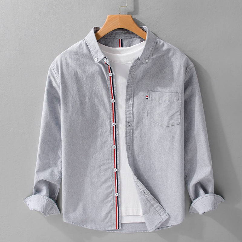 Versatile men's striped button-up shirt with relaxed fit. Perfect long-sleeve top for spring & summer casual wear.