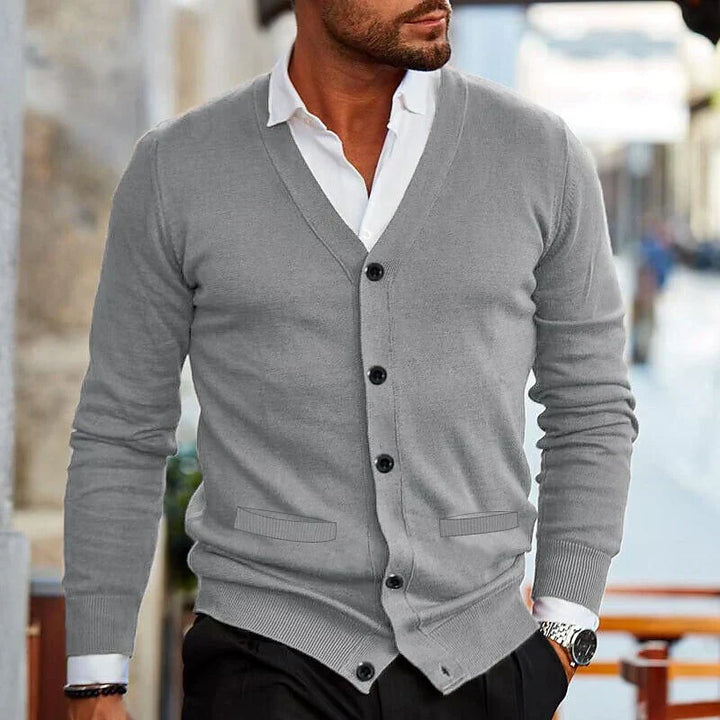 Stylish men's V-neck button cardigan, ideal for versatile layering in casual and everyday men's fashion.