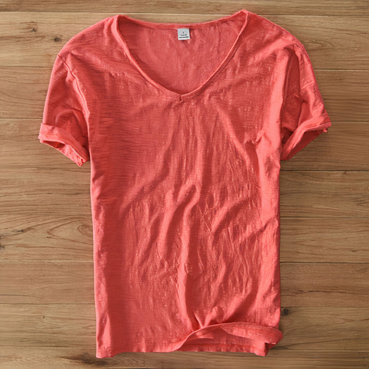 Close-up of breathable fabric on a men's V-neck summer t-shirt, ideal for comfort.