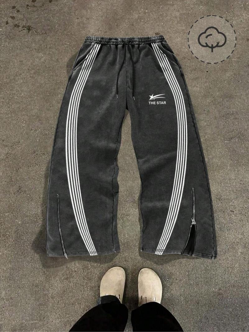 Men's performance track pants, Catania design, with flexible fit & zip hems for sports.