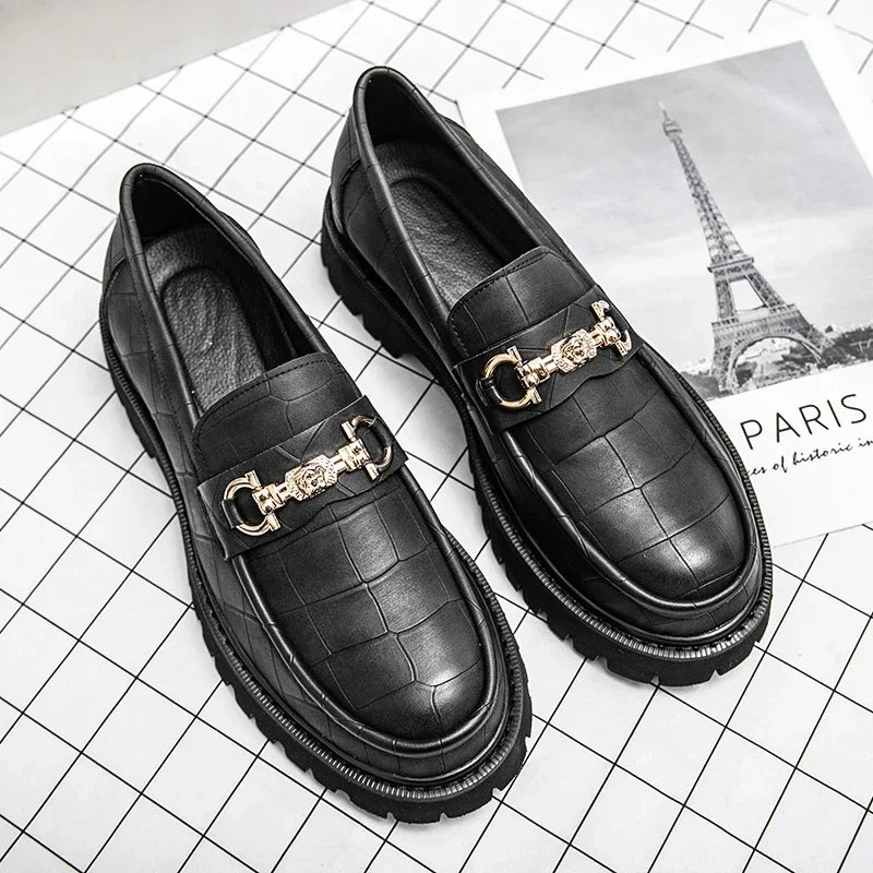 Sophisticated men's chain loafer. Black leather dress shoe with a modern lug sole for bold, contemporary style.