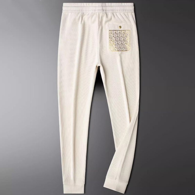 Luxury men's Cavo streetwear pants, designed for ultimate comfort with distinctive gold detail.