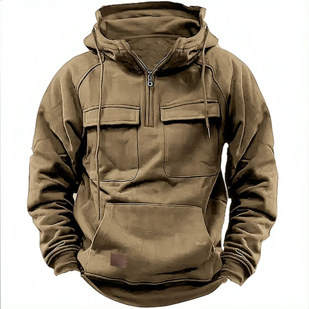 Close-up of a men's quarter-zip utility hoodie with functional pockets, ideal for streetwear and practical use.