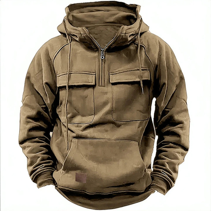 Close-up of a men's quarter-zip utility hoodie with functional pockets, ideal for streetwear and practical use.