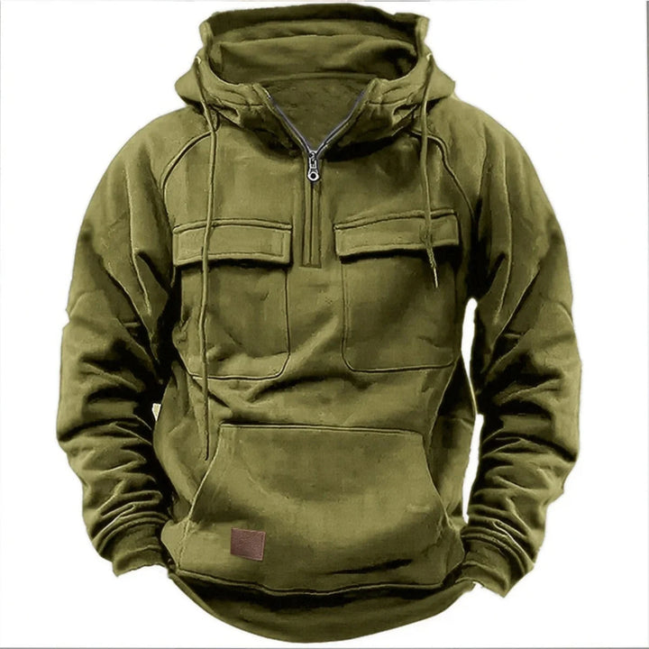 Man wearing a warm men's quarter-zip utility hoodie, perfect for urban style, casual wear & outdoor comfort.